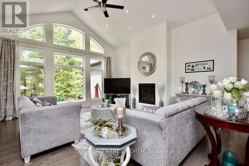 2 Sycamore Circle, Springwater, ON - Indoor Photo Showing Living Room With Fireplace