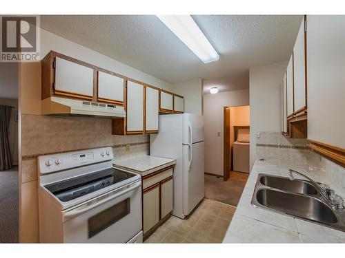 284 Yorkton Avenue Unit# 404, Penticton, BC - Indoor Photo Showing Kitchen With Double Sink