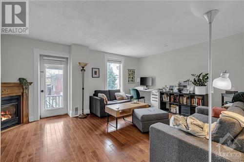 9 Melrose Avenue, Ottawa, ON - Indoor Photo Showing Living Room With Fireplace