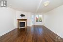 4524 Innes Road Unit#C, Ottawa, ON  - Indoor Photo Showing Living Room With Fireplace 