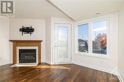 4524 Innes Road Unit#C, Ottawa, ON - Indoor Photo Showing Living Room With Fireplace