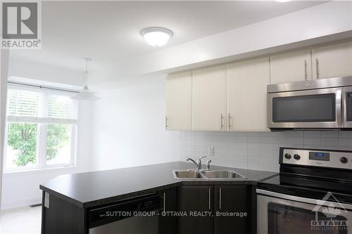 A - 4526 Innes Road, Ottawa, ON - Indoor Photo Showing Kitchen With Stainless Steel Kitchen With Double Sink