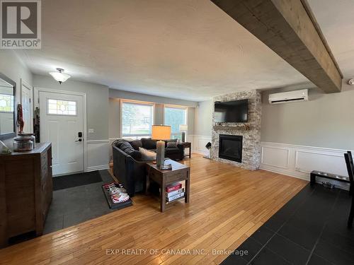 721 Churchill Street, Timmins (Upper Melrose), ON - Indoor Photo Showing Living Room With Fireplace