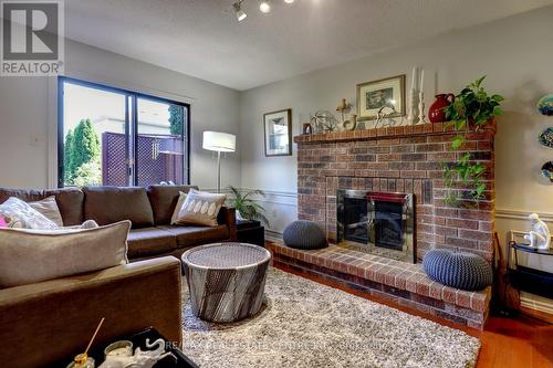 19 Pompano Court, Hamilton, ON - Indoor Photo Showing Living Room With Fireplace