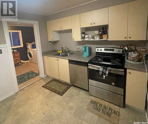 608 3Rd Avenue W, Meadow Lake, SK - Indoor Photo Showing Kitchen With Double Sink