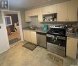 608 3Rd Avenue W, Meadow Lake, SK  - Indoor Photo Showing Kitchen With Double Sink 