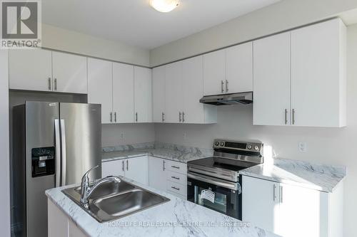 10 Rochester Drive, Barrie, ON - Indoor Photo Showing Kitchen With Double Sink