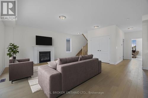 3033 Sierra Drive, Orillia, ON - Indoor Photo Showing Living Room With Fireplace