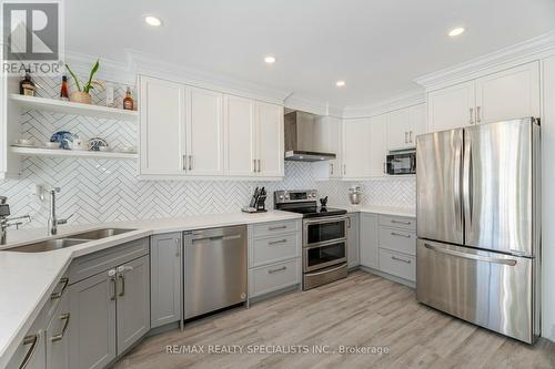 43 - 3600 Colonial Drive, Mississauga, ON - Indoor Photo Showing Kitchen With Stainless Steel Kitchen With Double Sink With Upgraded Kitchen