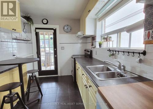 Upper - 687 Glencairn Avenue, Toronto, ON - Indoor Photo Showing Kitchen With Double Sink