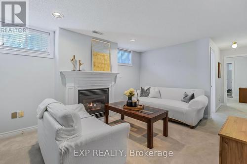 2024 Grovetree Lane, Burlington, ON - Indoor Photo Showing Living Room With Fireplace