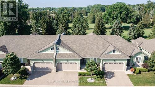 Bungalow Condo Backing onto Fairway. - 5 Oakwood Links Lane, Lambton Shores (Grand Bend), ON - Outdoor With Facade