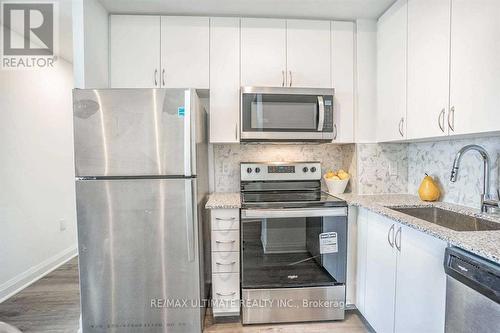 308 - 3220 Sheppard Avenue E, Toronto, ON - Indoor Photo Showing Kitchen With Upgraded Kitchen