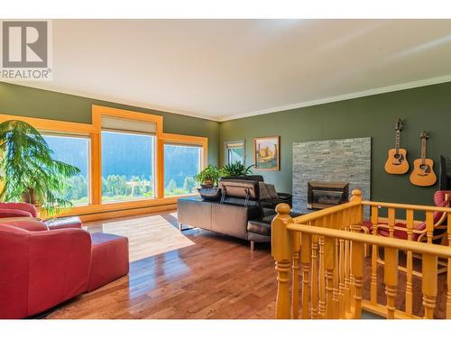 1628 Thrums Road, Thrums, BC - Indoor Photo Showing Living Room With Fireplace