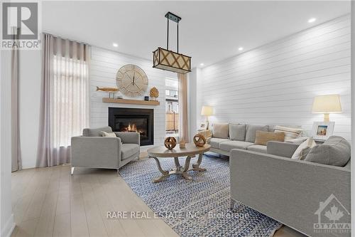 3279 Findlay Creek Drive, Ottawa, ON - Indoor Photo Showing Living Room With Fireplace