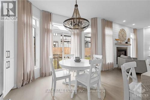 3279 Findlay Creek Drive, Ottawa, ON - Indoor Photo Showing Dining Room With Fireplace