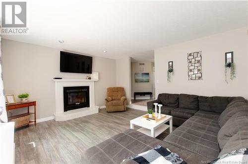 853 Melanson Road, Dieppe, NB - Indoor Photo Showing Living Room With Fireplace