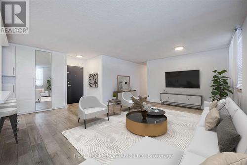 101 - 1660 Bloor Street, Mississauga, ON - Indoor Photo Showing Living Room