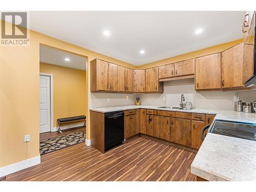 539 Sutherland Avenue Unit# 106, Kelowna, BC - Indoor Photo Showing Kitchen With Double Sink