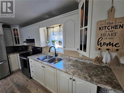 263 Poplar Street, Beresford, NB - Indoor Photo Showing Kitchen With Double Sink