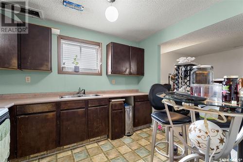 513 Empress Street, Saskatoon, SK - Indoor Photo Showing Kitchen With Double Sink