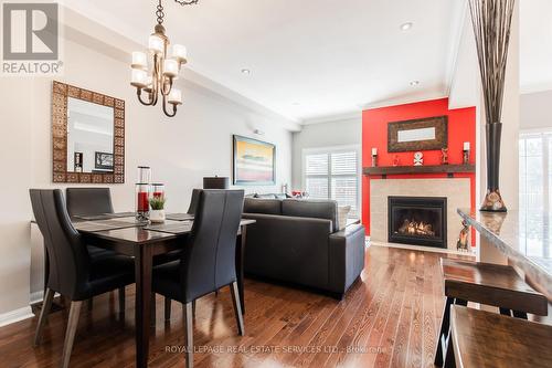 2423 Shadow Court, Oakville, ON - Indoor Photo Showing Dining Room With Fireplace