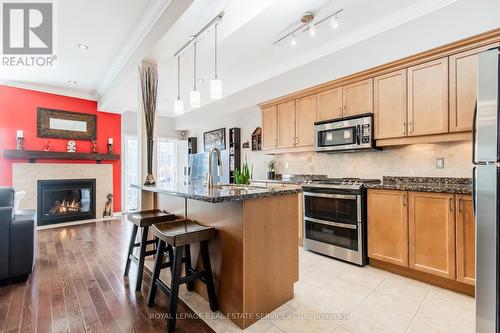 2423 Shadow Court, Oakville, ON - Indoor Photo Showing Kitchen With Fireplace