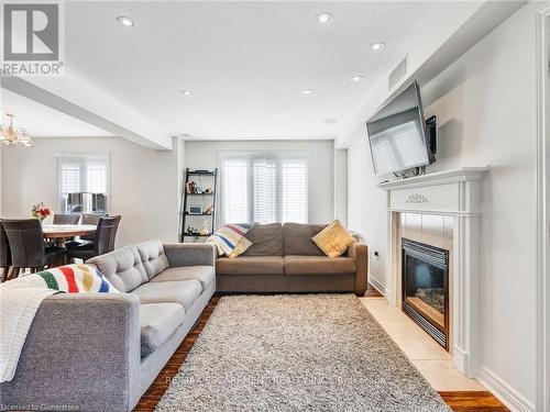 56 Geranium Avenue, Hamilton, ON - Indoor Photo Showing Living Room With Fireplace