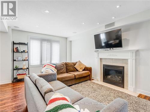 56 Geranium Avenue, Hamilton, ON - Indoor Photo Showing Living Room With Fireplace