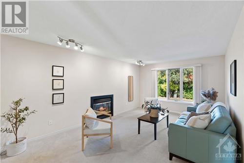 218 Walden Drive, Ottawa, ON - Indoor Photo Showing Living Room With Fireplace