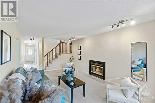 218 Walden Drive, Ottawa, ON - Indoor Photo Showing Living Room With Fireplace