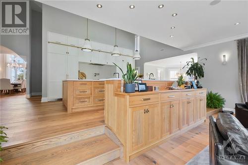 Never miss a thing in this wonderfully open kitchen overlooking the family room and entertaining areas. - 144 Kerry Hill Crescent, Ottawa, ON - Indoor Photo Showing Other Room