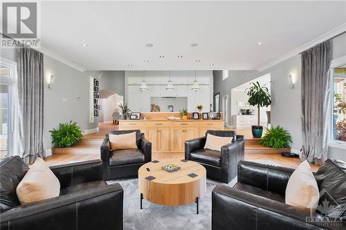 Sitting area for reading, games with friends or enjoying a drink before dinner is served. - 144 Kerry Hill Crescent, Ottawa, ON - Indoor Photo Showing Living Room