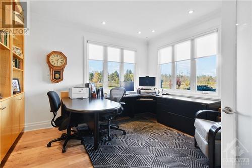 Bright front office with built in cabinetry and double doors to seclude yourself from the rest of the home. - 144 Kerry Hill Crescent, Ottawa, ON - Indoor Photo Showing Office