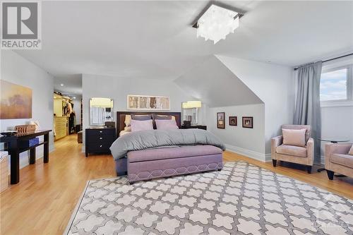 Loft bedroom suite with hardwood floors, sitting area and an impressive walk-in closet - 144 Kerry Hill Crescent, Ottawa, ON - Indoor