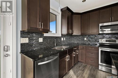 21 College Crescent, White City, SK - Indoor Photo Showing Kitchen With Stainless Steel Kitchen With Double Sink With Upgraded Kitchen