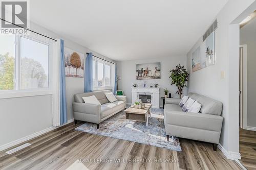 92 Charles Best Place, Kitchener, ON - Indoor Photo Showing Living Room With Fireplace