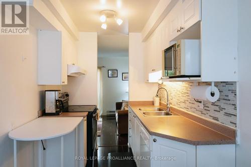 16 - 161 Bay Street, Quinte West, ON - Indoor Photo Showing Kitchen With Double Sink