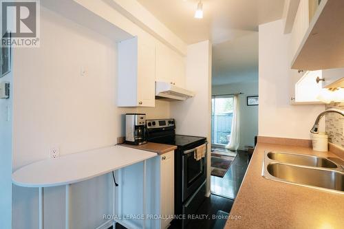 16 - 161 Bay Street, Quinte West, ON - Indoor Photo Showing Kitchen With Double Sink