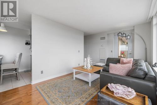 1202 - 18 Kenaston Gardens, Toronto, ON - Indoor Photo Showing Living Room