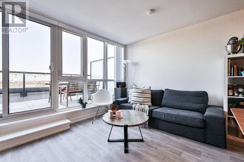 718 - 2300 St Clair Avenue W, Toronto, ON - Indoor Photo Showing Living Room