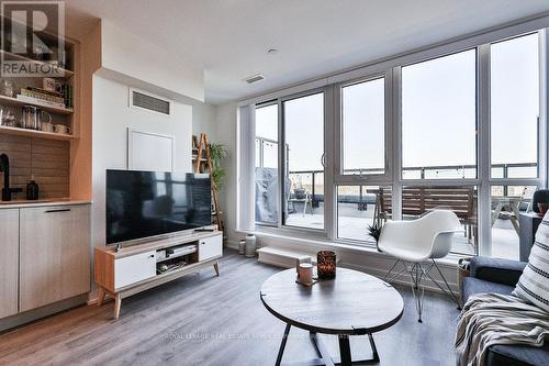 718 - 2300 St Clair Avenue W, Toronto, ON - Indoor Photo Showing Living Room