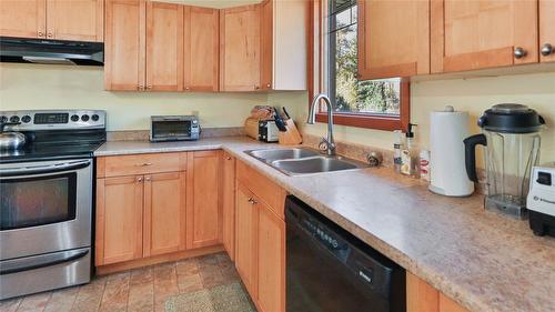 3225 Hwy 3, Rock Creek, BC - Indoor Photo Showing Kitchen With Double Sink