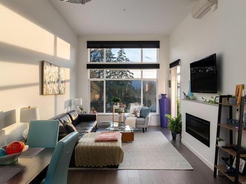 508-7162 West Saanich Rd, Central Saanich, BC - Indoor Photo Showing Living Room With Fireplace