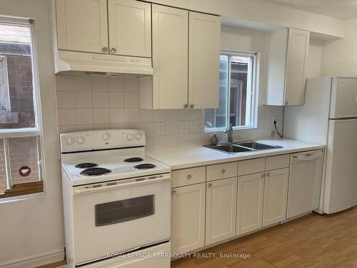 Main-135 Sheppard Ave W, Toronto, ON - Indoor Photo Showing Kitchen With Double Sink