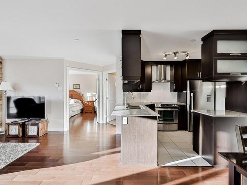 Overall view - 205-135 Rue Marcel-De La Sablonnière, Sainte-Thérèse, QC - Indoor Photo Showing Kitchen