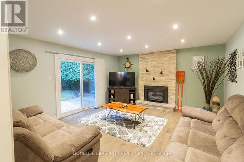 767 Barclay Road, London, ON - Indoor Photo Showing Living Room With Fireplace