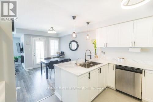 1669 Copeland Circle, Milton, ON - Indoor Photo Showing Kitchen With Double Sink With Upgraded Kitchen