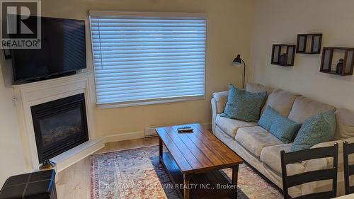 243 Lillian Crescent, Barrie, ON - Indoor Photo Showing Living Room With Fireplace