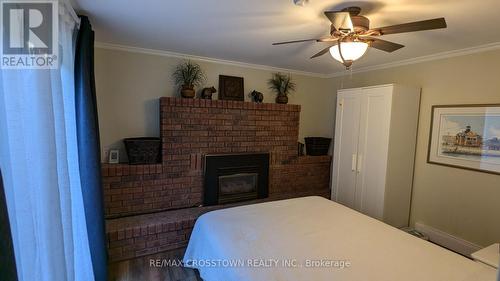 243 Lillian Crescent, Barrie, ON - Indoor Photo Showing Bedroom With Fireplace